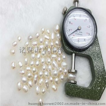 卓伟珍珠批发珍珠原料 6-7mm米型散珠 现场加工批发370元一斤